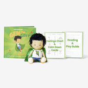 Children's book, plush toy, feelings chart, and calm down cards on a white background